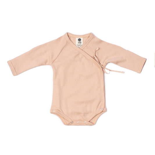 Newborn crossover bodysuit in dusty blush organic Egyptian cotton, front view